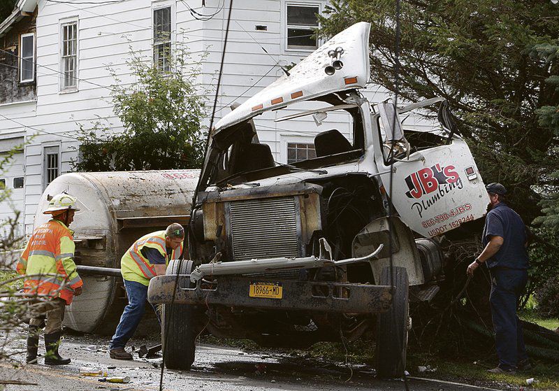 Truck crashes, spills sewage near Meredith